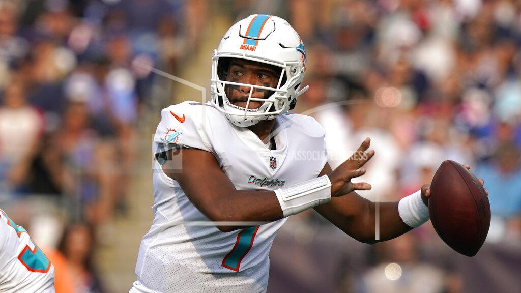 Steven Senne Miami Dolphins quarterback Tua Tagovailoa (1) looks to pass during the first half of an NFL football game against the New England Patriots, Sunday, Sept. 12, 2021, in Foxborough, Mass. (AP Photo/Steven Senne)