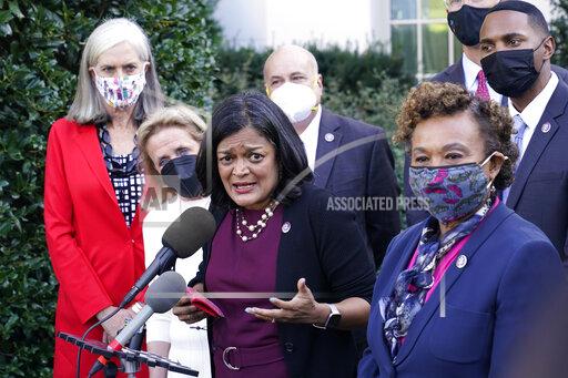 Rep. Pramila Jayapal, D-Wash., the chair of the Congressional Progressive Caucus, center, along with other lawmakers, talks with reporters outside the West Wing of the Washington, Tuesday, Oct. 19, 2021, following their meeting with President Joe Biden. Jayapal is joined by from left, Rep. Katherine Clark, D-Mass., Rep. Debbie Dingell, D-Mich., Rep. Mark Pocan, D-Wis., Rep. Barbara Lee, D-Calif., and Rep. Ritchie Torres, D-New York. (AP Photo/Susan Walsh)