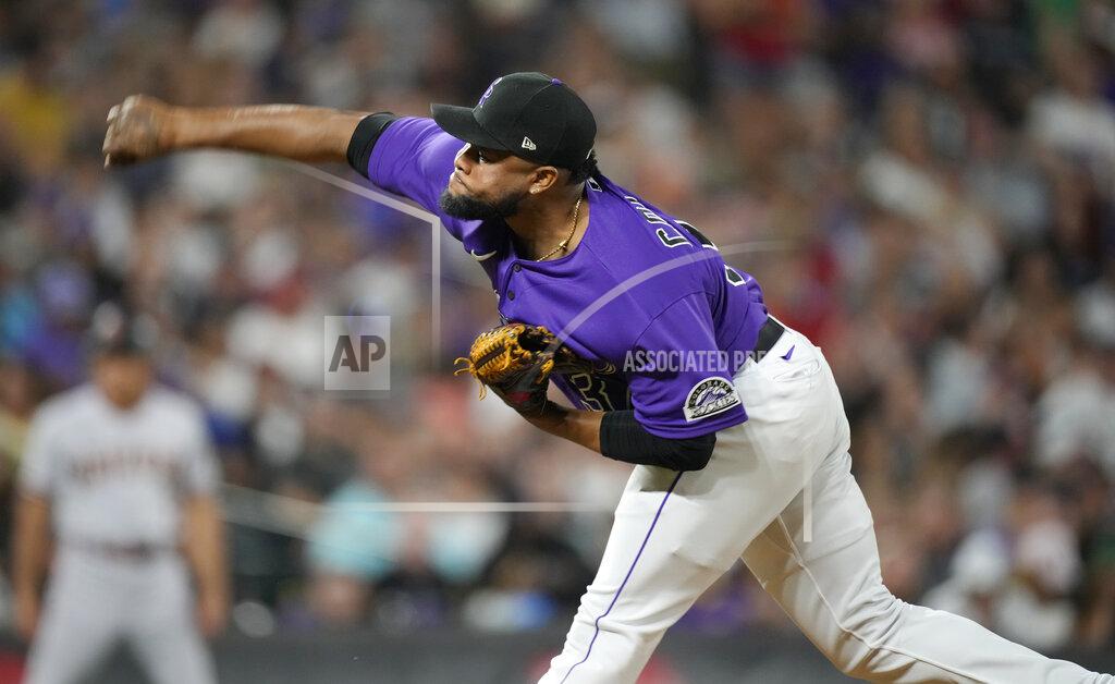 David Zalubowski Colorado Rockies relief pitcher Alex Colome works against the Arizona Diamondbacks during the eighth inning of a baseball game Saturday, July 2, 2022, in Denver. (AP Photo/David Zalubowski)