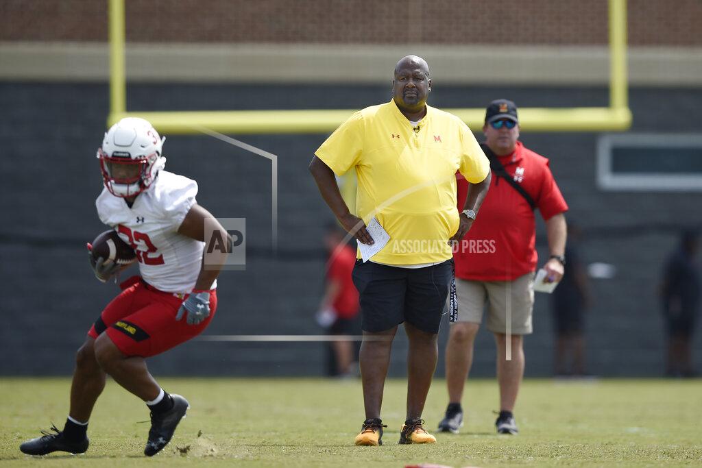 Gail Burton Maryland football head coach Michael Locksley watches during NCAA college football practice, Friday, Aug. 6, 2021, in College Park, Md.(AP Photo/Gail Burton)