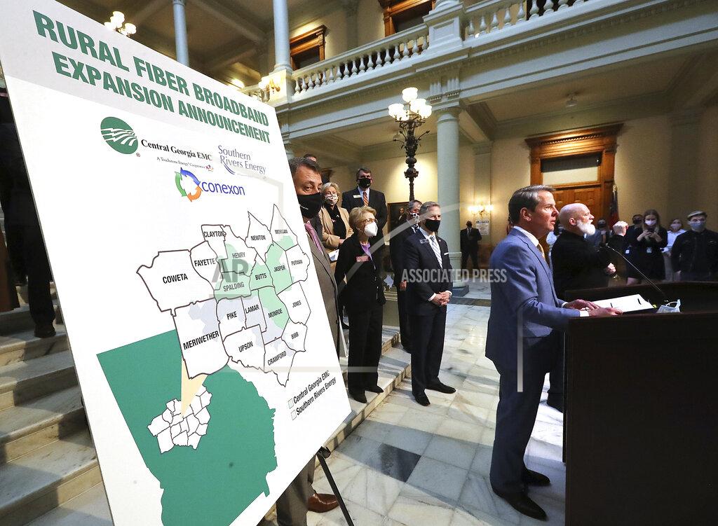 Curtis Compton FILE - In this Monday, Feb 8, 2021 file photo, Gov. Brian Kemp speaks during a news conference about expanding rural internet access in the state, at the Georgia Capitol in Atlanta. The federal American Rescue Plan, comes on top of $150 billion the federal government sent directly to states and local governments in 2020. This year's law cites infrastructure for water, sewer and broadband internet as allowable uses. (Curtis Compton/Atlanta Journal-Constitution via AP)