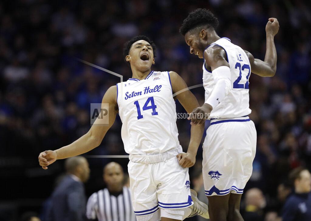 Kathy Willens Seton Hall guards Jared Rhoden (14) and Myles Cale (22) celebrate during the first half an NCAA college basketball game against the Villanova, Saturday, March 9, 2019, in Newark, N.J. (AP Photo/Kathy Willens)
