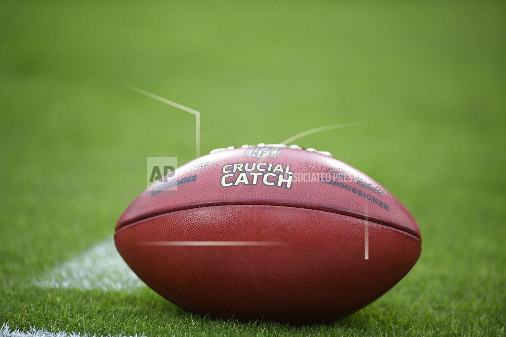 Nick Wass A football is seen with the Crucial Catch words during the second half of a NFL football game between the Baltimore Ravens and the Cincinnati Bengals Sunday, Oct. 13, 2019, in Baltimore. (AP Photo/Nick Wass)