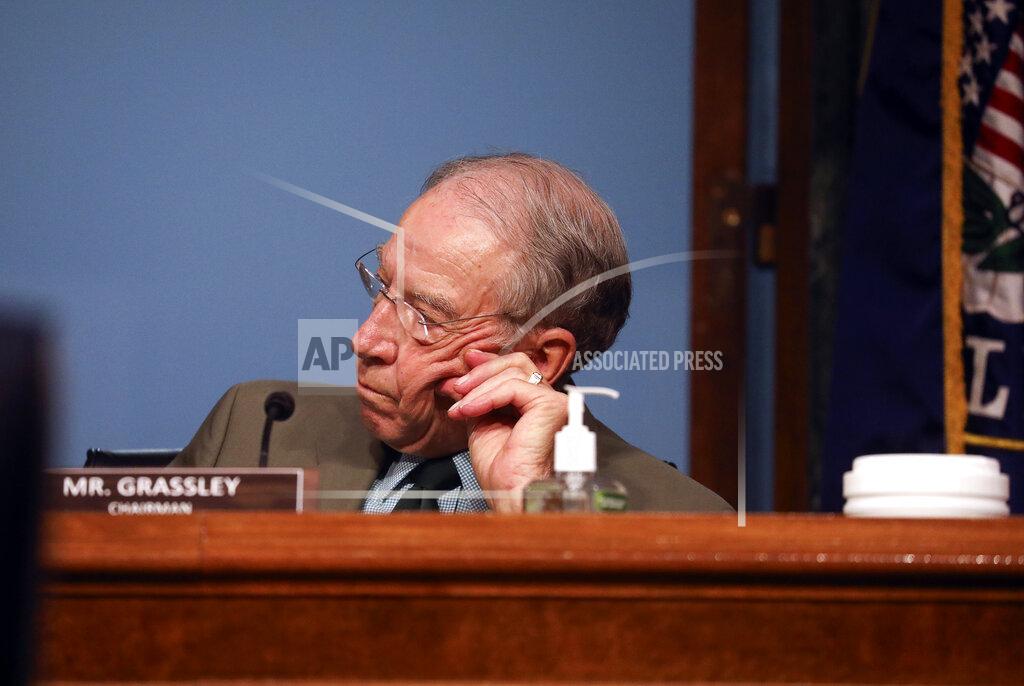 Chairman Sen. Chuck Grassley, R-Iowa, listens during a Senate Finance Committee hearing on "COVID-19/Unemployment Insurance" on Capitol Hill in Washington on Tuesday, June 9, 2020. (Leah Millis/Pool via AP)