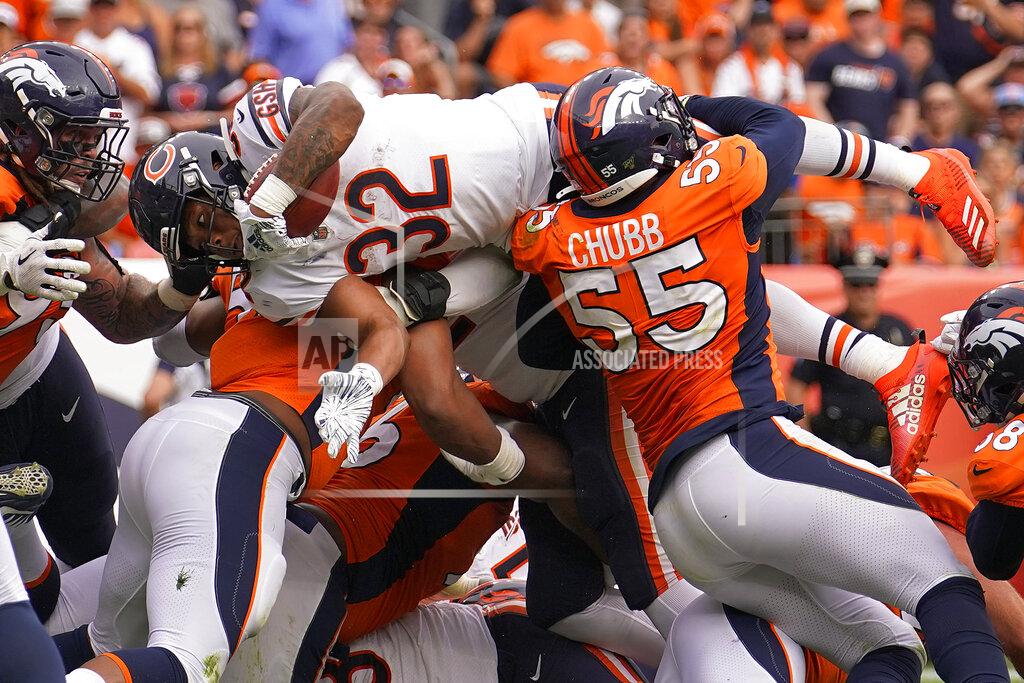 Jack Dempsey Chicago Bears running back David Montgomery (32) dives in for the touchdown as Denver Broncos outside linebacker Bradley Chubb (55) blocks during the second half of an NFL football game, Sunday, Sept. 15, 2019, in Denver. (AP Photo/Jack Dempsey)
