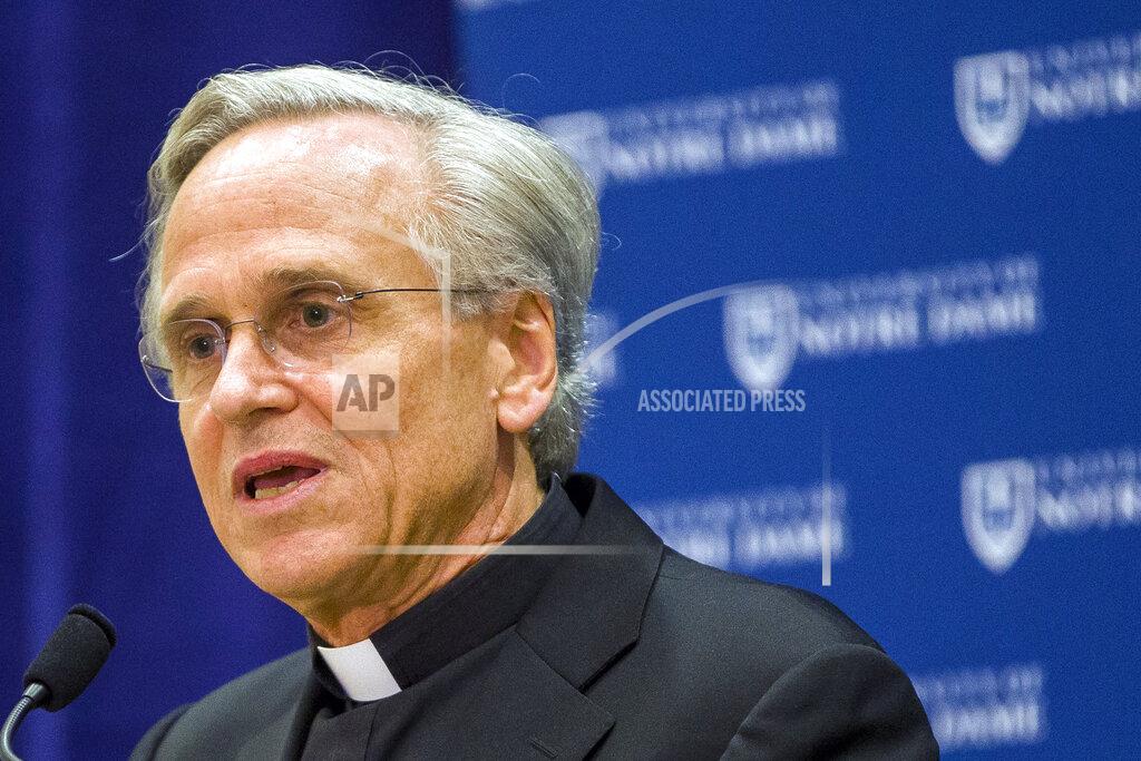 FILE - In this Oct. 11, 2019, file photo, University of Notre Dame President Rev. John I. Jenkins speaks during a news conference in South Bend, Ind. University of Notre Dame President Rev. John Jenkins has ended his period of quarantine after he tested positive for the coronavirus less than a week following his attendance at a White House event without wearing a mask. Jenkins "is symptom-free and looks forward to resuming his normal activities,” the university announced Monday OCT. 12, 2020. (Robert Franklin/South Bend Tribune via AP, File)