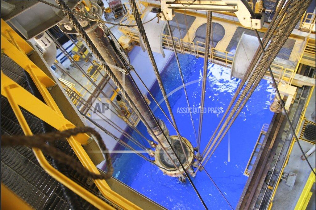 Uncredited In this July 13, 2017, released by the U.S. Bureau of Safety and Environmental Enforcement, An oil industry facility in the Gulf of Mexico is seen. Oil wells in waters at least 1,000 feet deep now account for about 90 percent of crude from the Gulf, one of the world's largest offshore oil fields. (U.S. Bureau of Safety and Environmental Enforcement via AP)