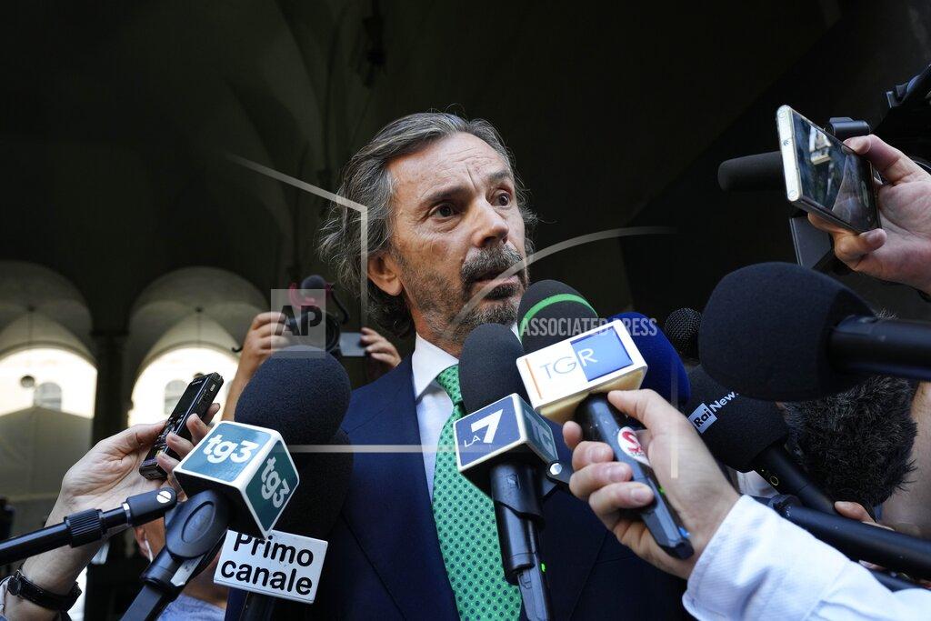 Antonio Calanni Giovanni Paolo Accinni, lawyer of former CEO of Atlantia Giovanni Castellucci, talks to journalists outside the Genoa's Palace of Justice on the opening of the first hearing of the trial for the Morandi bridge collapse, Thursday, July 7, 2022. Forty-three people were killed when a large stretch of the Morandi Bridge broke off, August 14, 2018, on the eve of one of Italy's biggest vacation holidays. (AP Photo/Antonio Calanni)