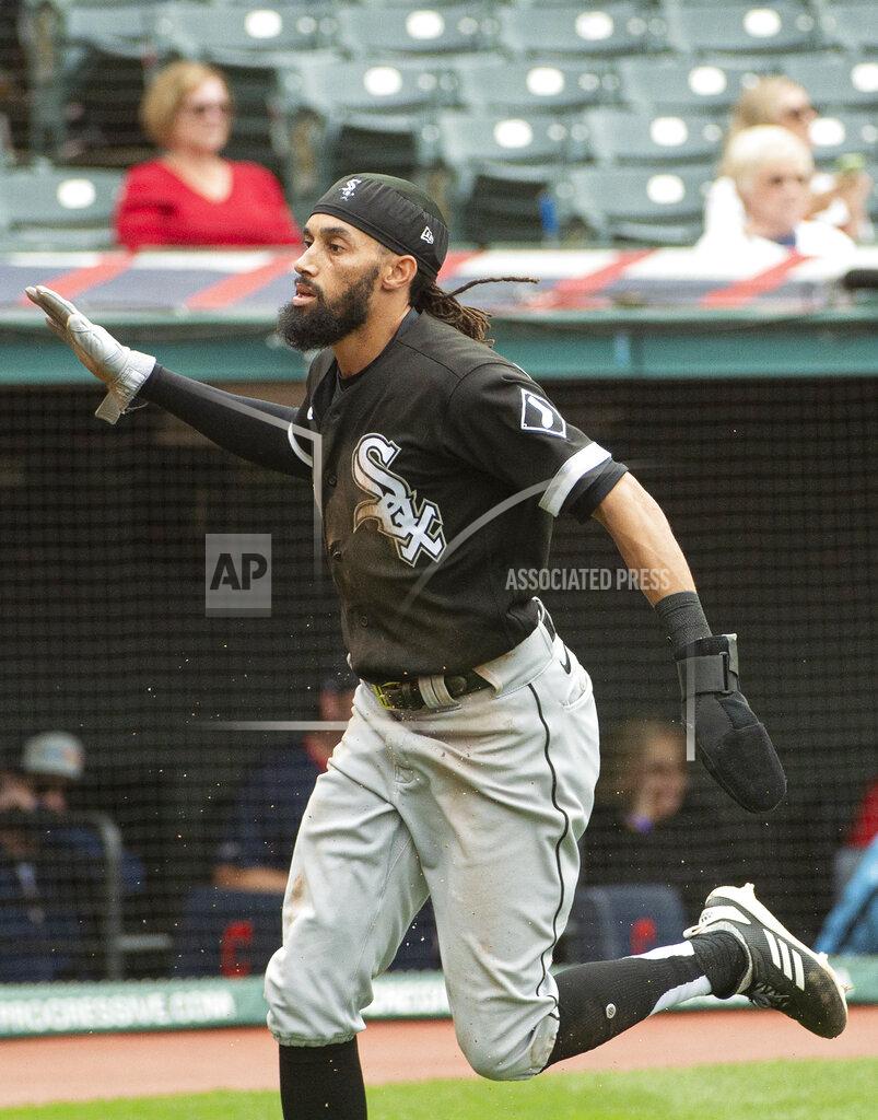 Phil Long Chicago White Sox's Billy Hamilton celebrates after scoring on a steal against the Cleveland Indians during the eighth inning inning of a baseball game in Cleveland, Sunday, Sept. 26, 2021. (AP Photo/Phil Long)