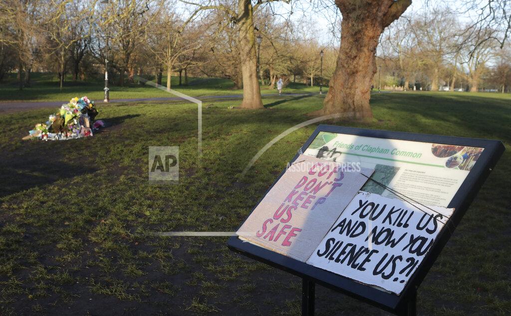 Tony Hicks Placards and floral tributes are placed near the bandstand in Clapham Common on Sunday, March 14, 2021, in memory of Sarah Everard who was abducted and murdered after last being seen walking home from a friend's apartment in south London on the night of March 3. Hundreds of people in London defied coronavirus restrictions Saturday to pay their respects to Everard who disappeared while walking home and was found dead a week later. (AP Photo/Tony Hicks)