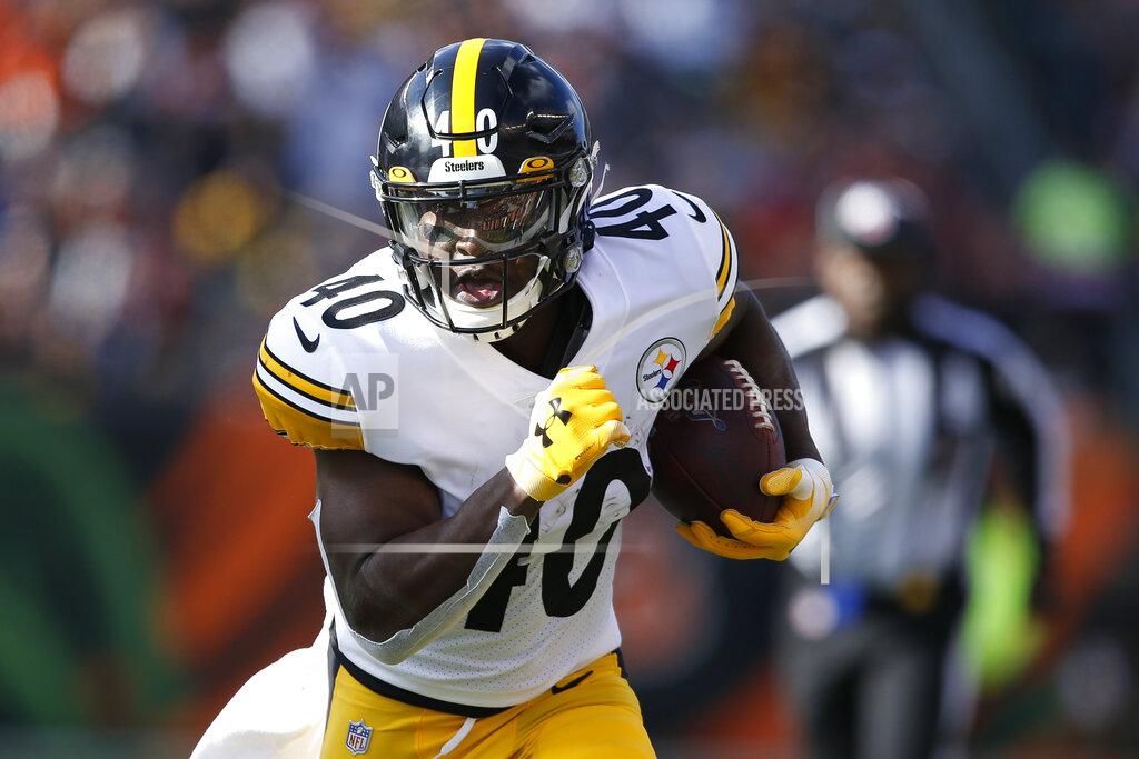 Gary Landers Pittsburgh Steelers running back Kerrith Whyte runs the ball during the first half an NFL football game against the Cincinnati Bengals, Sunday, Nov. 24, 2019, in Cincinnati. (AP Photo/Gary Landers)