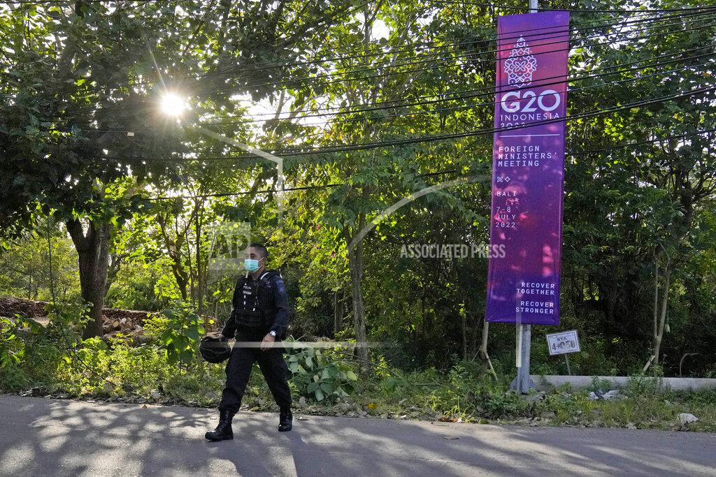 Dita Alangkara A police officer walks past a G20 Foreign Ministers' Meeting in Nusa Dua, Bali, Indonesia, Thursday, July 7, 2022. Foreign ministers from the Group of 20 leading rich and developing nations are gathering in Indonesia's resort island of Bali for talks bound to be dominated by the conflict in Ukraine despite an agenda focused on global cooperation and food and energy security. (AP Photo/Dita Alangkara)