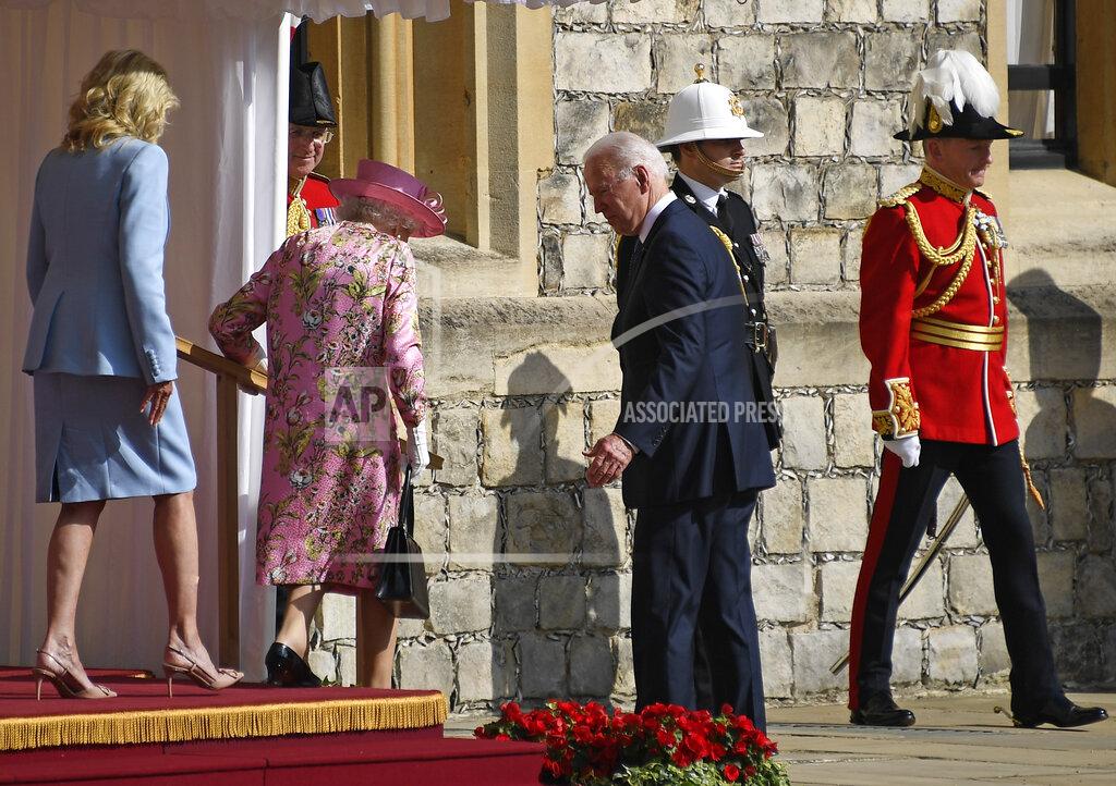 Alberto Pezzali US President Joe Biden, First Lady Jill Biden and Britain's Queen Elizabeth II leave the dais after receiving Guard of Honour at Windsor Castle near London, Sunday, June 13, 2021. (AP Photo/Alberto Pezzali)