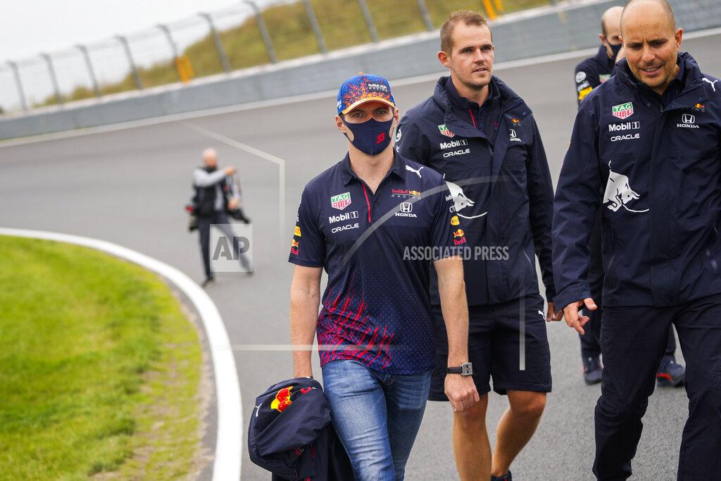 Francisco Seco Red Bull driver Max Verstappen of the Netherlands walks the track ahead of Sunday's Formula One Dutch Grand Prix at the Zandvoort racetrack, Netherlands, Thursday, Sept. 2, 2021. (AP Photo/Francisco Seco)
