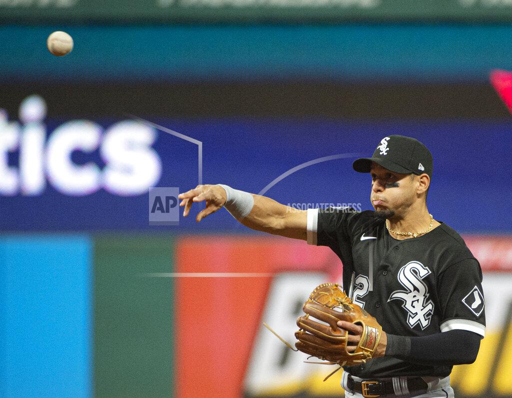 Phil Long Chicago White Sox's Cesar Hernandez throws Cleveland Indians' Amed Rosario out at first base during the third inning of a baseball game in Cleveland, Saturday, Sept. 25, 2021. (AP Photo/Phil Long)
