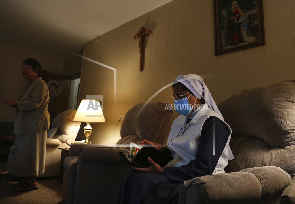 Jessie Wardarski Sister Rose Nellivila sits for morning prayer at St. Anne Home in Greensburg, Pa., where she serves as a nurse for residents of the nursing facility, on Thursday, March 25, 2021. Nellivila contracted the coronavirus last fall and made a full recovery, but a fellow nun, Sister Mary Evelyn Labik, died in October. (AP Photo/Jessie Wardarski)