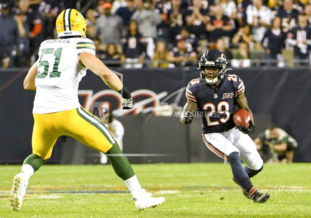 David Banks Chicago Bears' Tarik Cohen runs against Green Bay Packers' Kyler Fackrell during the first half of an NFL football game Thursday, Sept. 5, 2019, in Chicago. (AP Photo/David Banks)