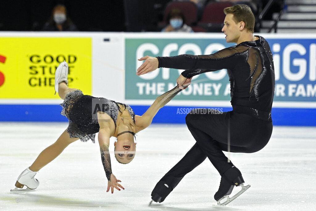 David Becker Aleksandra Boikova and Dmitrii Kozlovskii, of Russia, perform during the pairs short program at the Skate America figure skating event Friday, Oct. 22, 2021, in Las Vegas. (AP Photo/David Becker)
