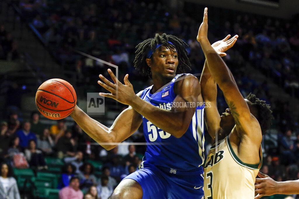 Butch Dill Memphis forward Precious Achiuwa (55) throws a pass as UAB guard Tavin Lovan (3) defends during the second half of an NCAA college basketball game Saturday, Dec. 7, 2019, in Birmingham, Ala. (AP Photo/Butch Dill)