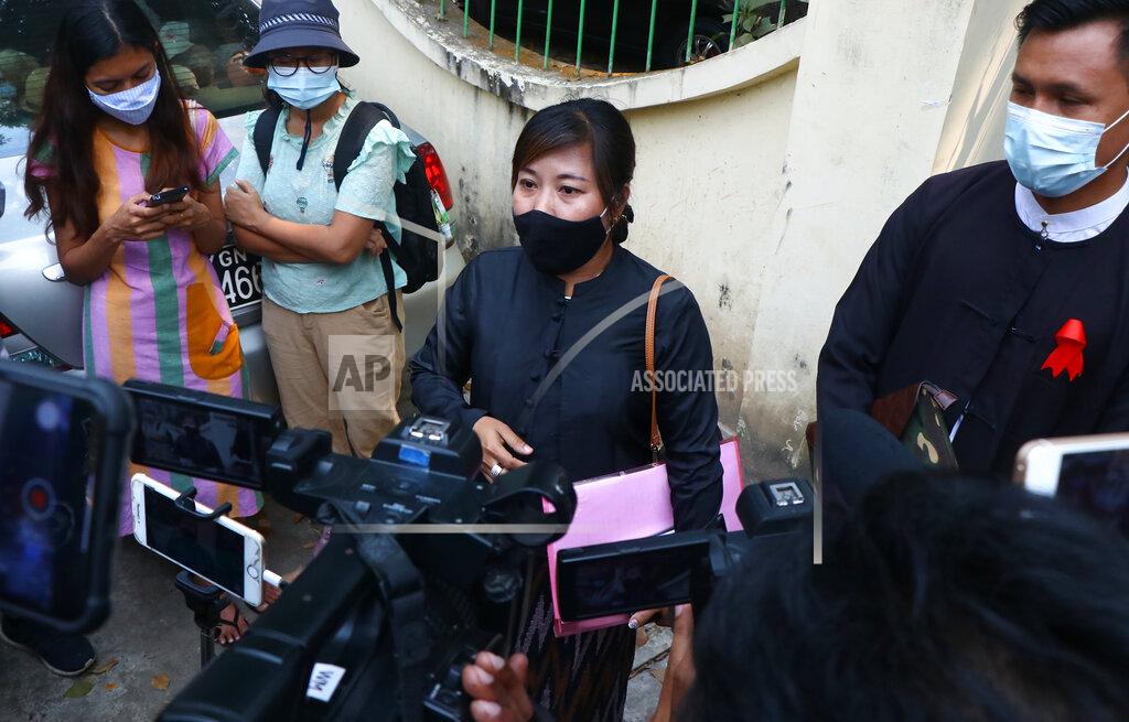 Uncredited Tin Zar Oo, a lawyer representing the Associated Press journalist Thein Zaw, speaks to reporters outside the Kamayut court in Yangon, Myanmar Friday, Mar. 12, 2021. The court is scheduled to hold a hearing on Friday for Thein Zaw who was detained while covering demonstrations against the military's seizure of power last month. He is facing a charge that could send him to prison for three years. (AP Photo)