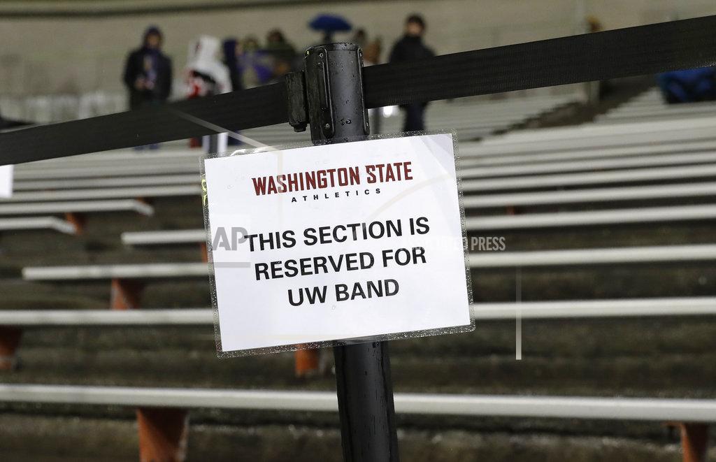Ted S. Warren A section of the stands in Martin Stadium remains reserved for members of the Washington marching band before an NCAA college football game against Washington State, Friday, Nov. 23, 2018, in Pullman, Wash., despite statements from Washington officials that the UW band will not be performing Friday after one of the buses carrying band members overturned on Interstate 90 while traveling to the game Thursday night. (AP Photo/Ted S. Warren)