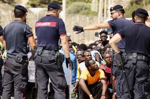 Top EU official heads to an Italian island struggling w... - Vimarsana News