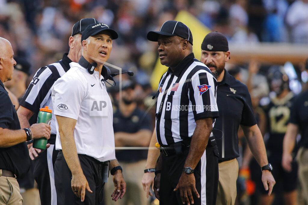 Nell Redmond Wake Forest coach Dave Clawson argues with officials as his team plays North Carolina during the first half of an NCAA college football game in Winston-Salem, N.C., Friday, Sept. 13, 2019. Wake Forest won 24-18. (AP Photo/Nell Redmond)