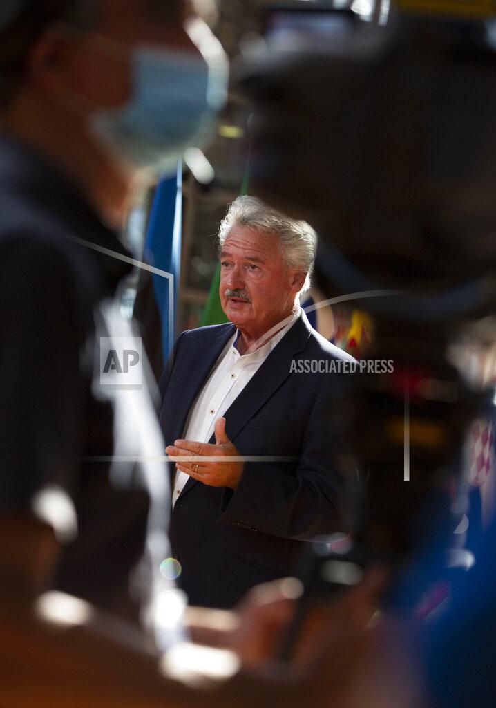 Virginia Mayo Luxembourg's Foreign Minister Jean Asselborn makes a statement to the media as he arrives for a meeting of EU foreign ministers at the European Council building in Brussels, Monday, July 13, 2020. European Union foreign ministers meet for the first time face-to-face since the pandemic lockdown and will assess their fraught relations with China and discuss the troubled relation with Turkey. (AP Photo/Virginia Mayo, Pool)