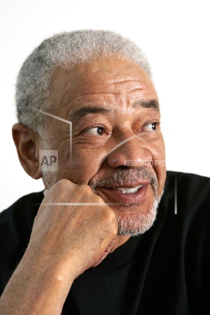 Reed Saxon FILE - In this June 21, 2006 file photo, singer-songwriter Bill Withers poses in his office in Beverly Hills, Calif. Withers, who wrote and sang a string of soulful songs in the 1970s that have stood the test of time, including “Lean On Me,” “Lovely Day” and “Ain’t No Sunshine," died in Los Angeles from heart complications on Monday, March 30, 2020. He was 81. (AP Photo/Reed Saxon, File)