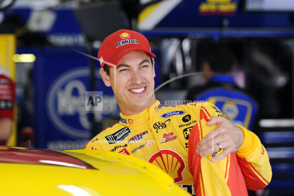 Mike Mccarn Joey Logano gets into his car to practice for Sunday's NASCAR Cup Series auto race at Charlotte Motor Speedway in Concord, N.C., Saturday, Sept. 28, 2019. (AP Photo/Mike McCarn)