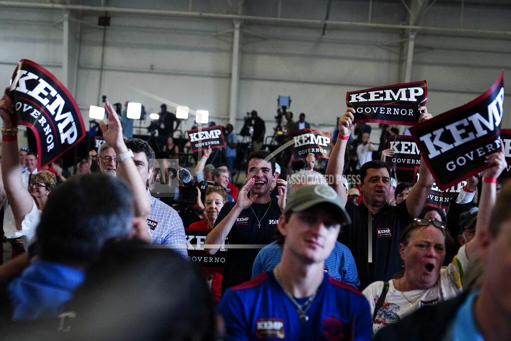 Brynn Anderson The crowd cheers as former Vice President Mike Pence speaks on behalf of Georgia Gov. Brian Kemp during a rally, Monday, May 23, 2022, in Kennesaw, Ga. Pence is opposing former President Donald Trump and his preferred Republican candidate for Georgia governor, former U.S. Sen. David Perdue. (AP Photo/Brynn Anderson)