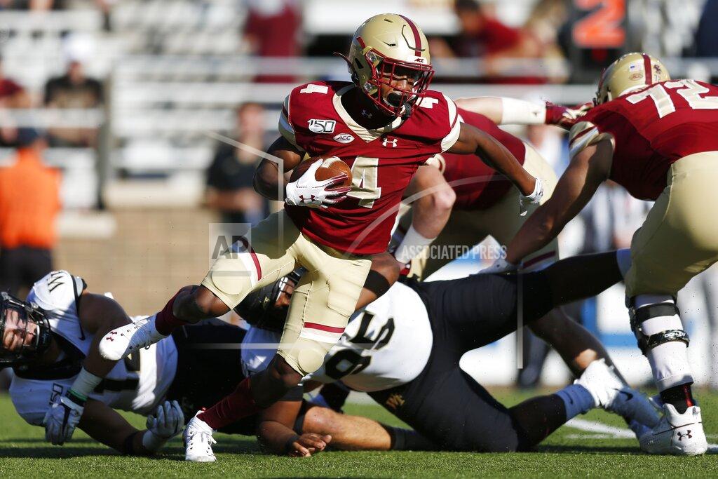 Michael Dwyer Boston College wide receiver Zay Flowers (4) carries the ball against Wake Forest during the first half of an NCAA college football game in Boston, Saturday, Sept. 28, 2019. (AP Photo/Michael Dwyer)