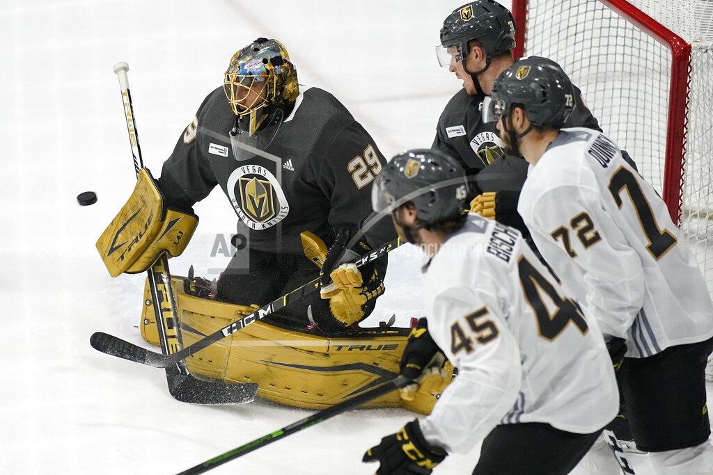 John Locher Vegas Golden Knights goaltender Marc-Andre Fleury (29) blocks a shot during an NHL hockey training camp Wednesday, Jan. 6, 2021, in Las Vegas. (AP Photo/John Locher)