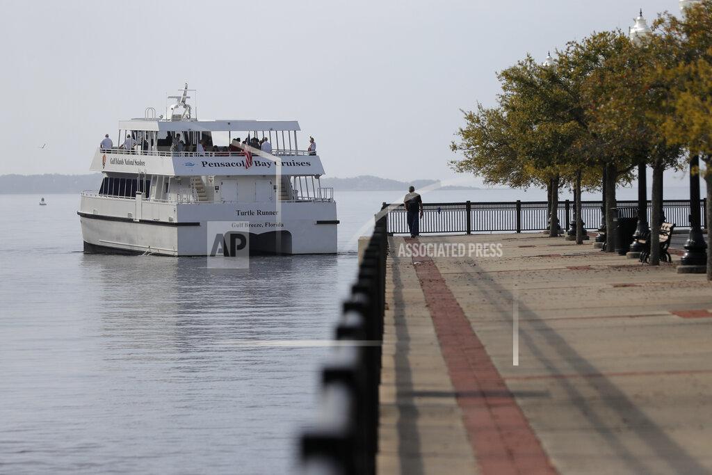 Gerald Herbert In this March 13, 2020, photo, the "Turtle Runner" ferryboat, which transports people from downtown to the beaches, and was funded with money from BP due to the Deepwater Horizon oil spill, leaves dock in Pensacola, Fla. As oil spewed into the Gulf of Mexico from a blown-out BP well in 2010, residents wondered whether their home would ever be the same. But this much is clear: From a baseball stadium and beaches, to roads and a seashore ferry, with island and coastal restoration sprinkled throughout, life along the Gulf Coast is forever changed. (AP Photo/Gerald Herbert)