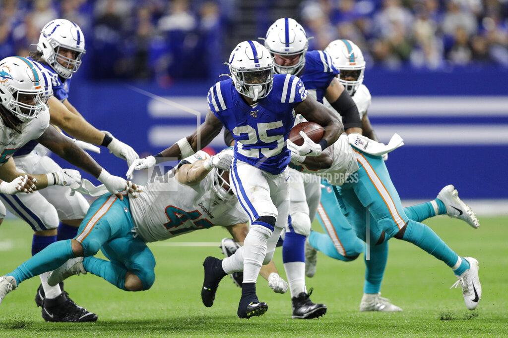 Darron Cummings Indianapolis Colts running back Marlon Mack (25) carries against the Miami Dolphins during the second half of an NFL football game in Indianapolis, Sunday, Nov. 10, 2019. (AP Photo/Darron Cummings)