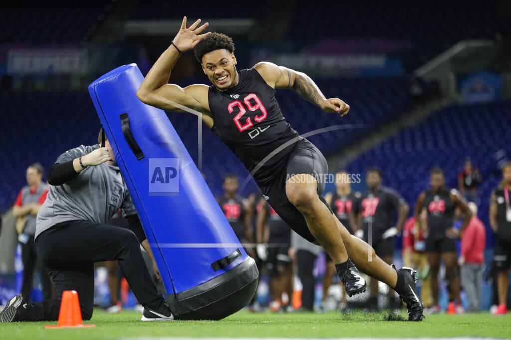 Michael Conroy Penn State defensive lineman Yetur Gross-Matos runs a drill at the NFL football scouting combine in Indianapolis, Saturday, Feb. 29, 2020. (AP Photo/Michael Conroy)