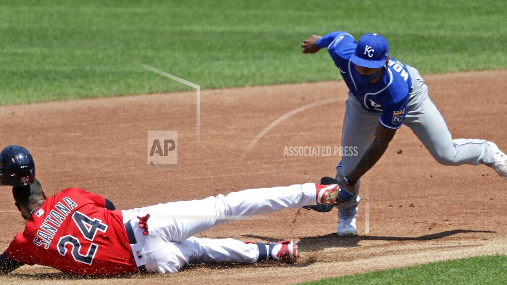 Tony Dejak Cleveland Indians' Domingo Santana is tagged out by Kansas City Royals' Adalberto Mondesi at second base in the first inning of a baseball game, Sunday, July 26, 2020, in Cleveland. Santana tried to advance to second base on a single on the play. (AP Photo/Tony Dejak)