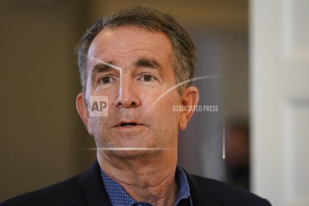 File-This Monday, March 15, 2021 file photo shows Virginia Gov. Ralph Northam at the Governor's Mansion in Richmond, Va. A bill that recently passed the Democrat-controlled General Assembly aims to fix several issues with Virginia's unemployment system that were laid bare by the pandemic. (AP Photo/Steve Helber)