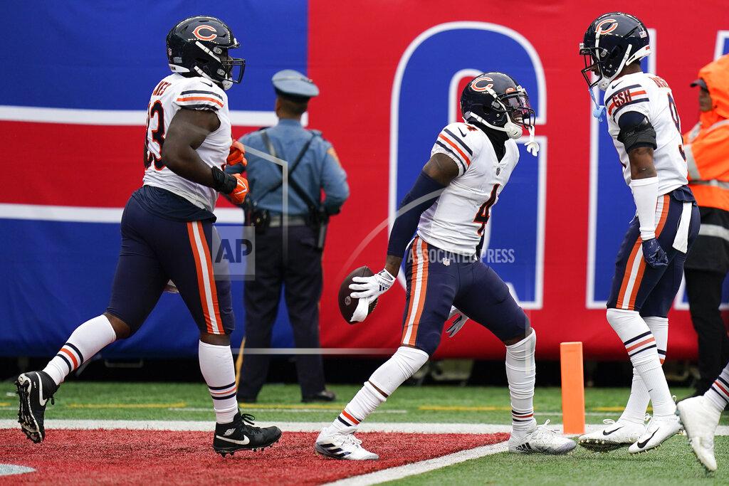 Seth Wenig Chicago Bears safety Eddie Jackson (4) celebrates with safety Jaquan Brisker (9) after intercepting the ball against the New York Giants during the fourth quarter of an NFL football game, Sunday, Oct. 2, 2022, in East Rutherford, N.J. (AP Photo/Seth Wenig)