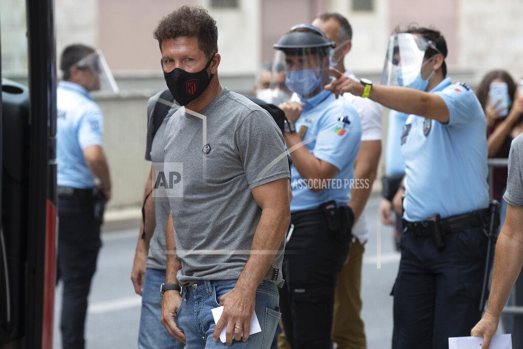 Manu Fernandez Atletico's Madrid Diego Simeone arrives to the team hotel in Lisbon, Portugal, Tuesday, Aug. 11, 2020. Atletico are scheduled to play Leipzig in a Champions League Quarter Final soccer match on Thursday. (AP Photo/Manu Fernandez)