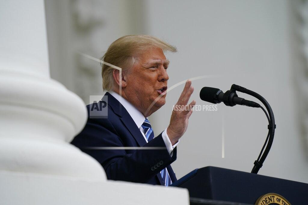 Alex Brandon President Donald Trump speaks from the Blue Room Balcony of the White House to a crowd of supporters, Saturday, Oct. 10, 2020, in Washington. (AP Photo/Alex Brandon)
