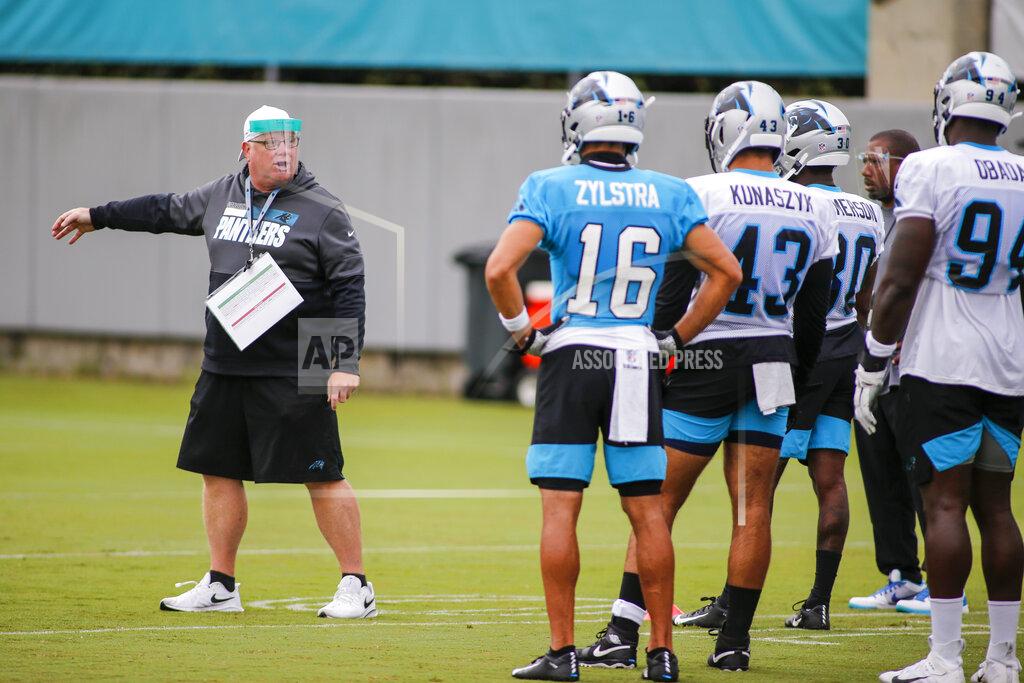 Nell Redmond Carolina Panthers special teams assistant coach Ed Foley, left, directs players during NFL football training camp practice Sunday, Aug. 16, 2020 in Charlotte, N.C. (AP Photo/Nell Redmond)