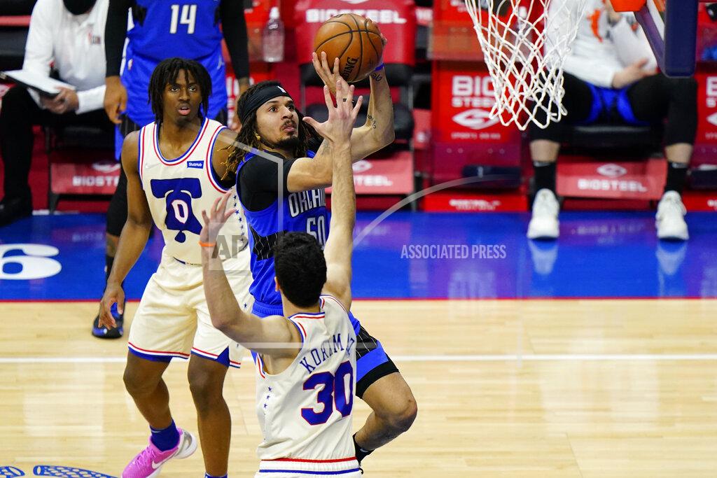 Matt Slocum Orlando Magic's Cole Anthony (50) goes up for a shot against Philadelphia 76ers' Furkan Korkmaz (30) during the second half of an NBA basketball game, Sunday, May 16, 2021, in Philadelphia. (AP Photo/Matt Slocum)