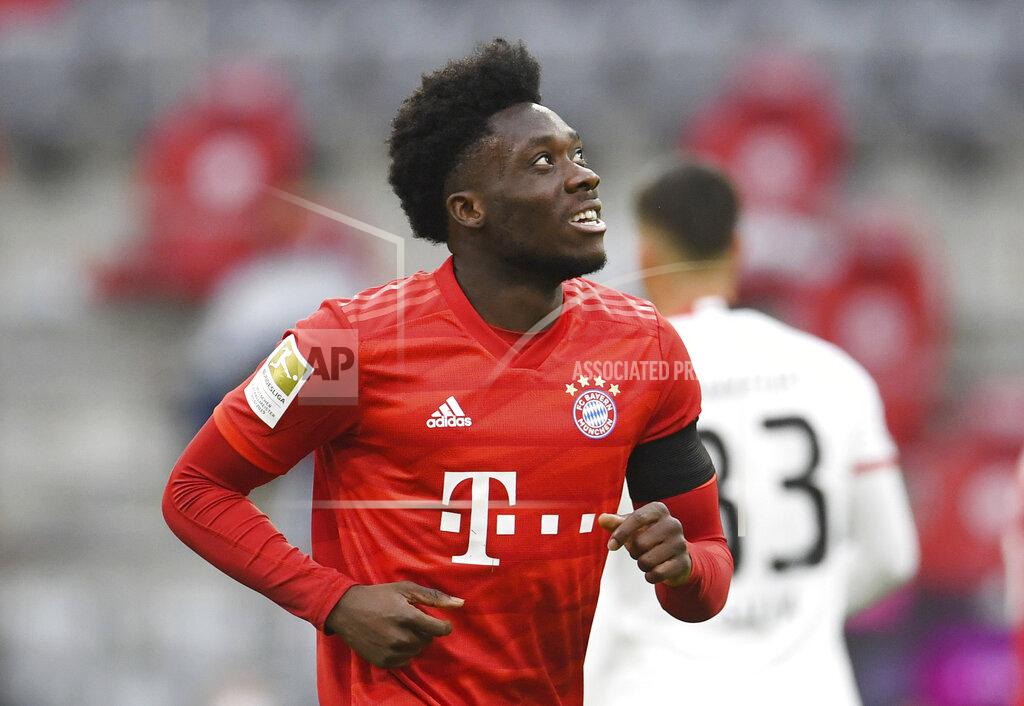 Andreas Gebert Bayern Munich's Alphonso Davies celebrates scoring Munich's fourth goal during the German Bundesliga soccer match between Bayern Munich and Eintracht Frankfurt in Munich, Germany, Saturday, May 23, 2020. (Andreas Gebert/pool via AP)