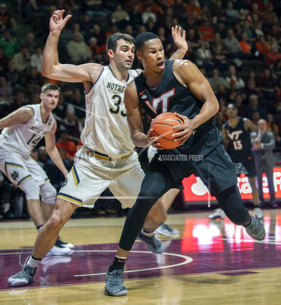 Don Petersen Virginia Tech forward Kerry Blackshear Jr. (24) looks to pass against Notre Dame forward John Mooney (33) during the second half of an NCAA college basketball game Tuesday, Jan. 1, 2019, in Blacksburg, Va. Virginia Tech won 81-66. (AP Photo/Don Petersen)