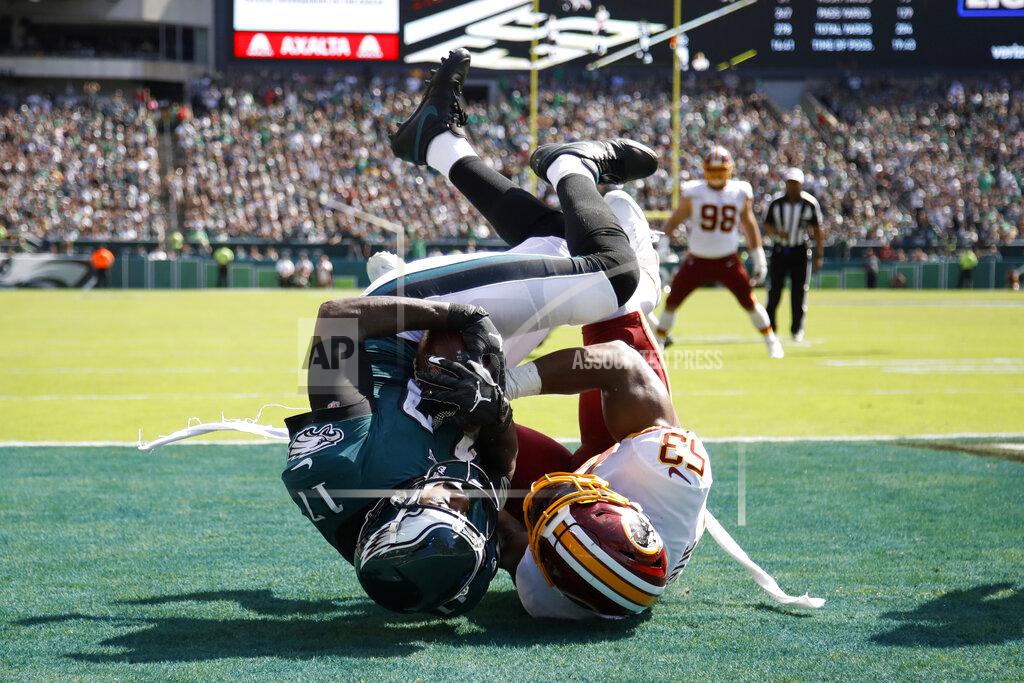 Matt Rourke Philadelphia Eagles' Alshon Jeffery, left, hangs onto a touchdown pass against Washington Redskins' Jon Bostic during the second half of an NFL football game Sunday, Sept. 8, 2019, in Philadelphia. (AP Photo/Matt Rourke)