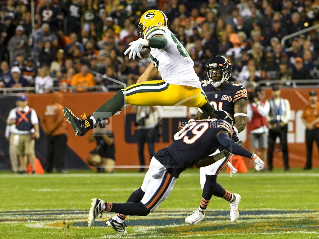 David Banks Green Bay Packers' Jimmy Graham leaps over Chicago Bears' Eddie Jackson during the first half of an NFL football game Thursday, Sept. 5, 2019, in Chicago. (AP Photo/David Banks)