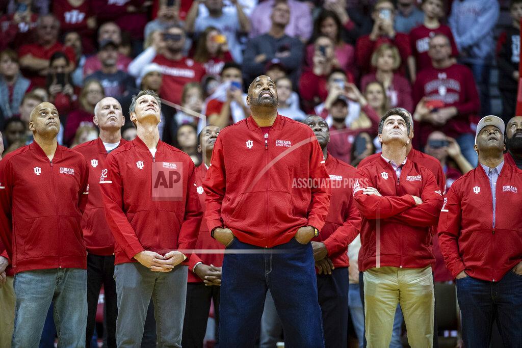 Doug Mcschooler Former Indiana players that were being recognized on court for their 1980 Big Ten championship look up to the video screen to watch a presentation produced to honor former head coach Bobby Knight during halftime of an NCAA college basketball game, Saturday, Feb. 8, 2020, in Bloomington, Ind. Purdue won 74-62. (AP Photo/Doug McSchooler)