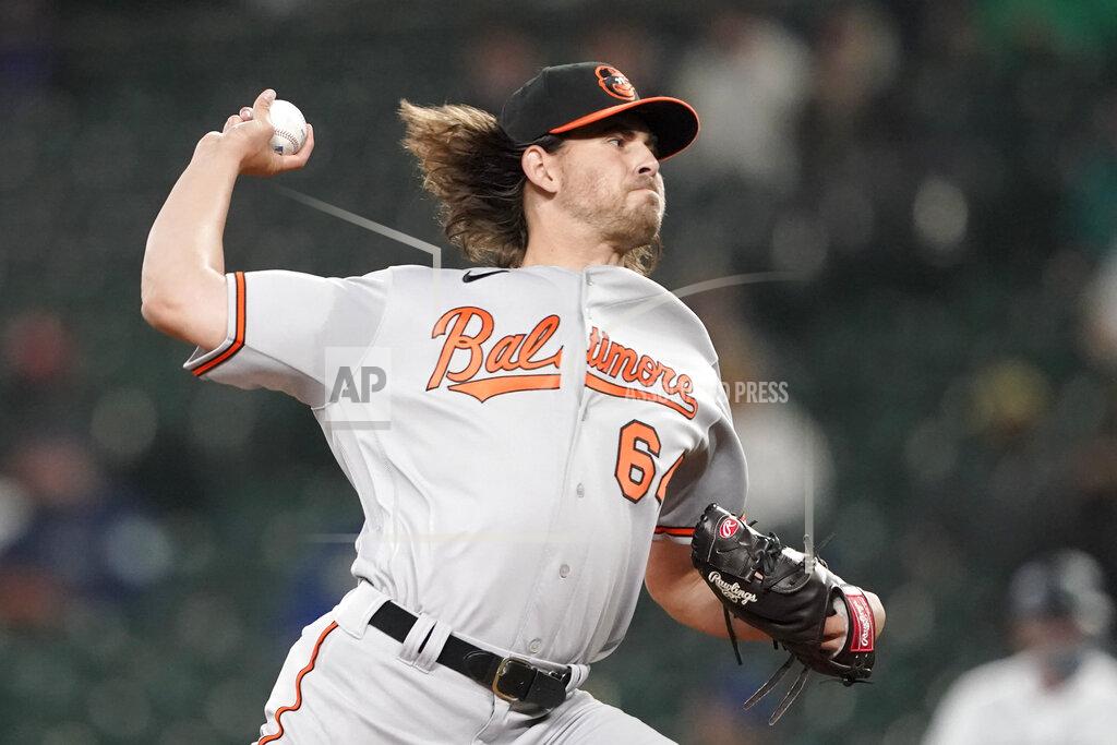 Ted S. Warren Baltimore Orioles starting pitcher Dean Kremer throws against the Seattle Mariners during the first inning of a baseball game, Monday, May 3, 2021, in Seattle. (AP Photo/Ted S. Warren)