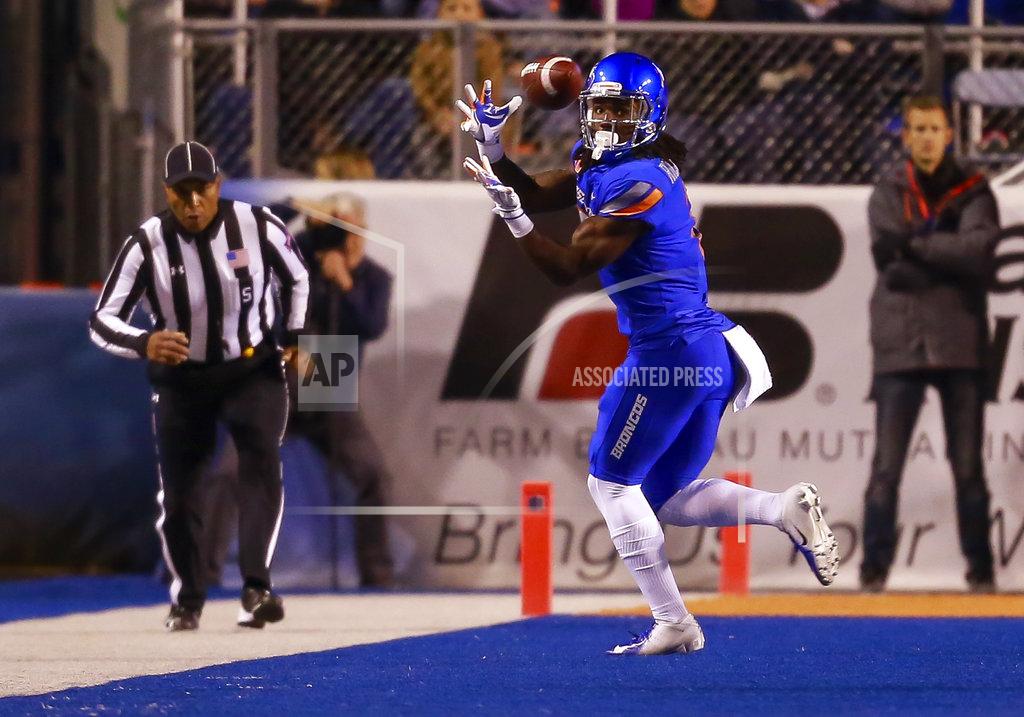 Steve Conner Boise State wide receiver A.J. Richardson (7) turns back for the ball on a reception against BYU during the first half of an NCAA college football game Saturday, Nov. 3, 2018, in Boise, Idaho. (AP Photo/Steve Conner)